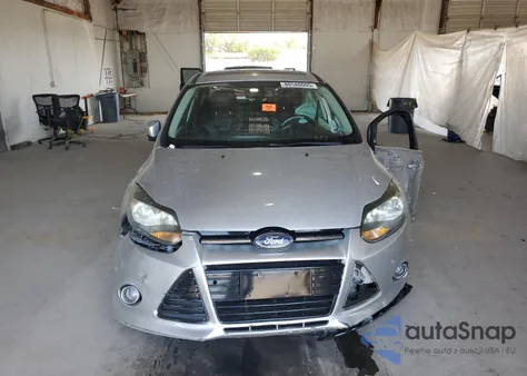 2012 Ford Focus Titanium from USA, damaged, VIN 1FAHP3J21CL187807